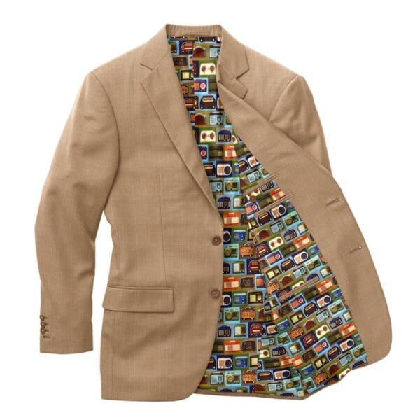 A tan jacket with a camera print on the inside of it.