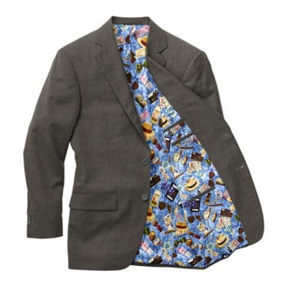 A suit jacket with a tie and a blue floral shirt.