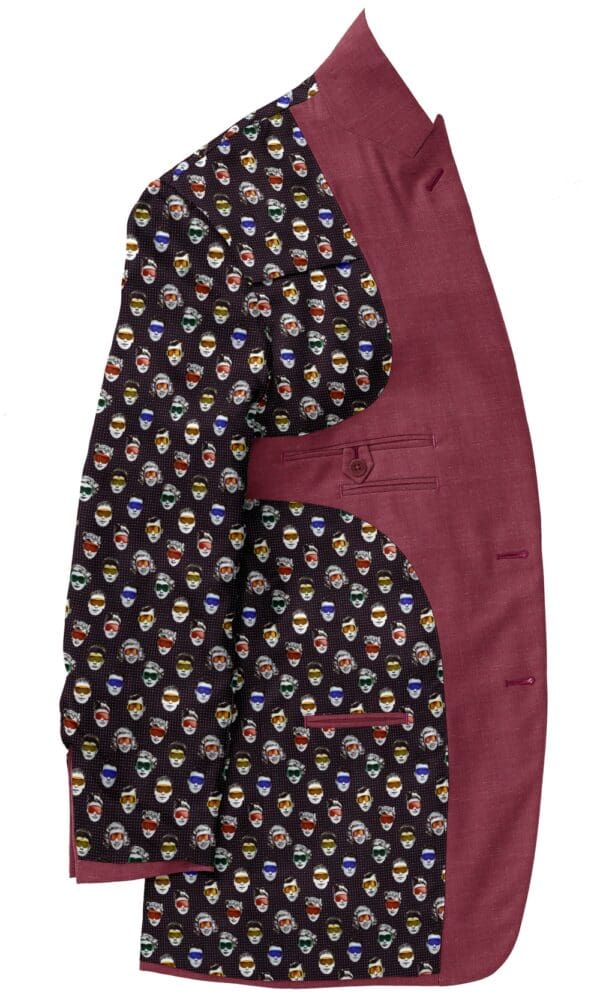 A black and red tie with faces on it