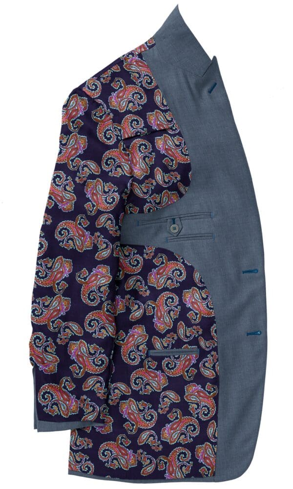 A suit jacket and pants with paisley designs.