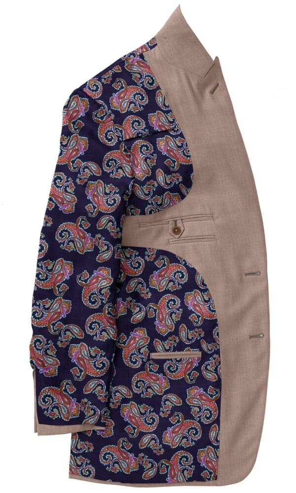 A suit jacket with a paisley pattern on it.