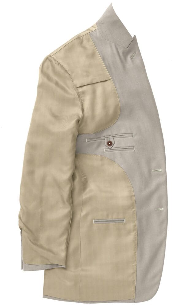 A tan jacket with two buttons on the side.