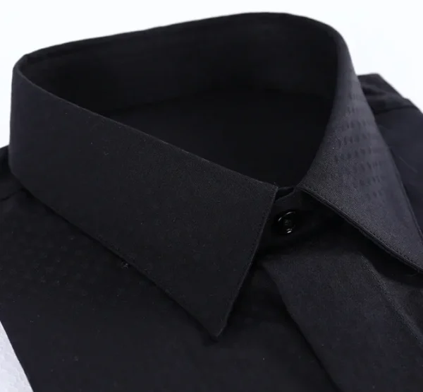 A black shirt with a tie on it