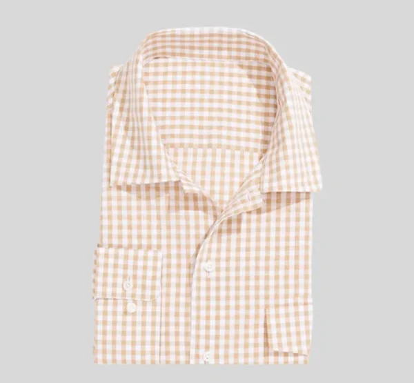 A white and brown checkered shirt is folded