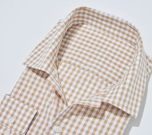 A close up of the collar and cuffs on a shirt