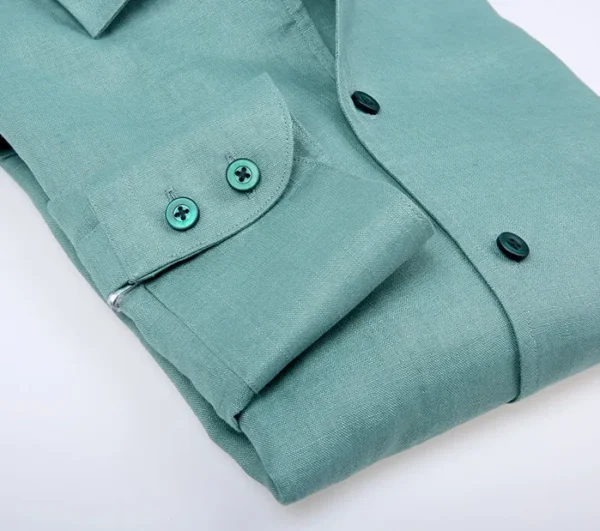 A close up of the buttons on a shirt