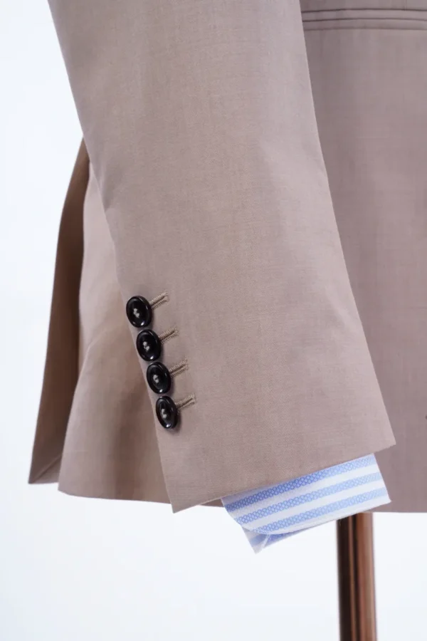 A close up of the buttons on a jacket