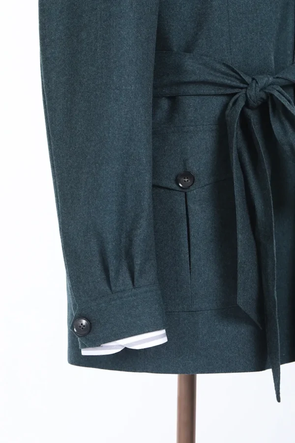 A close up of the sleeve and waist of a jacket.