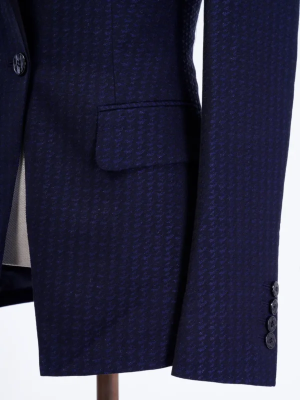 A close up of the pocket on a suit