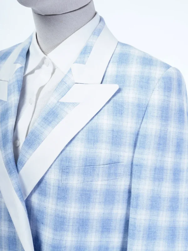 A suit that is blue and white plaid.