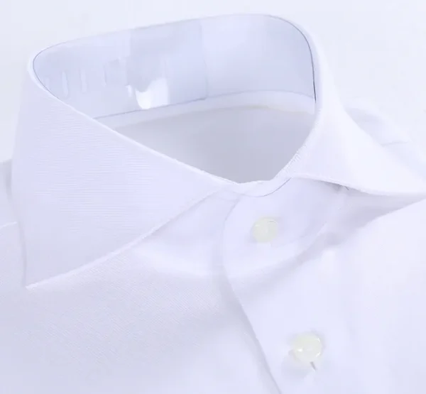 A close up of the collar of a white shirt