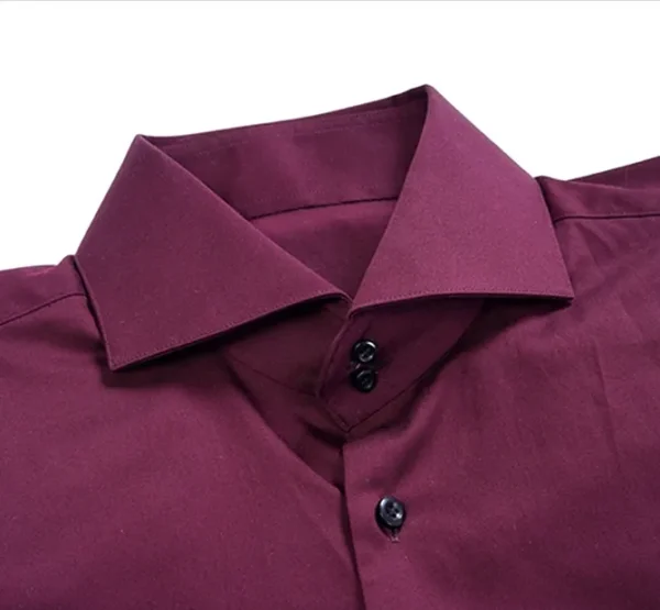 A close up of the collar and cuffs on a shirt.