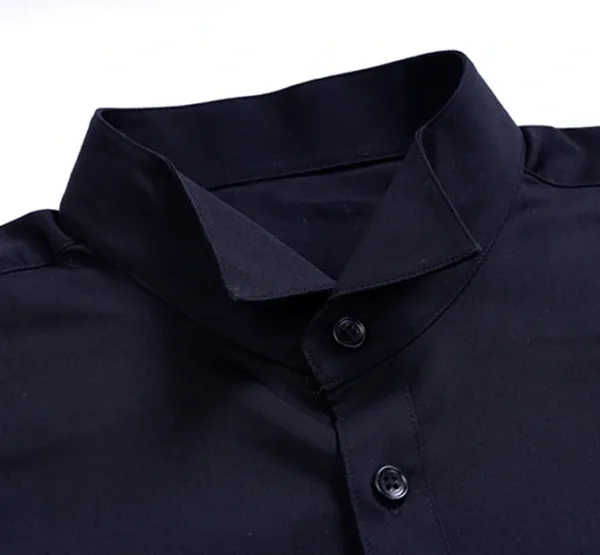 A close up of the collar on a black shirt