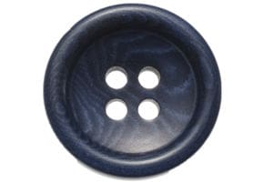 A button with four holes on it.